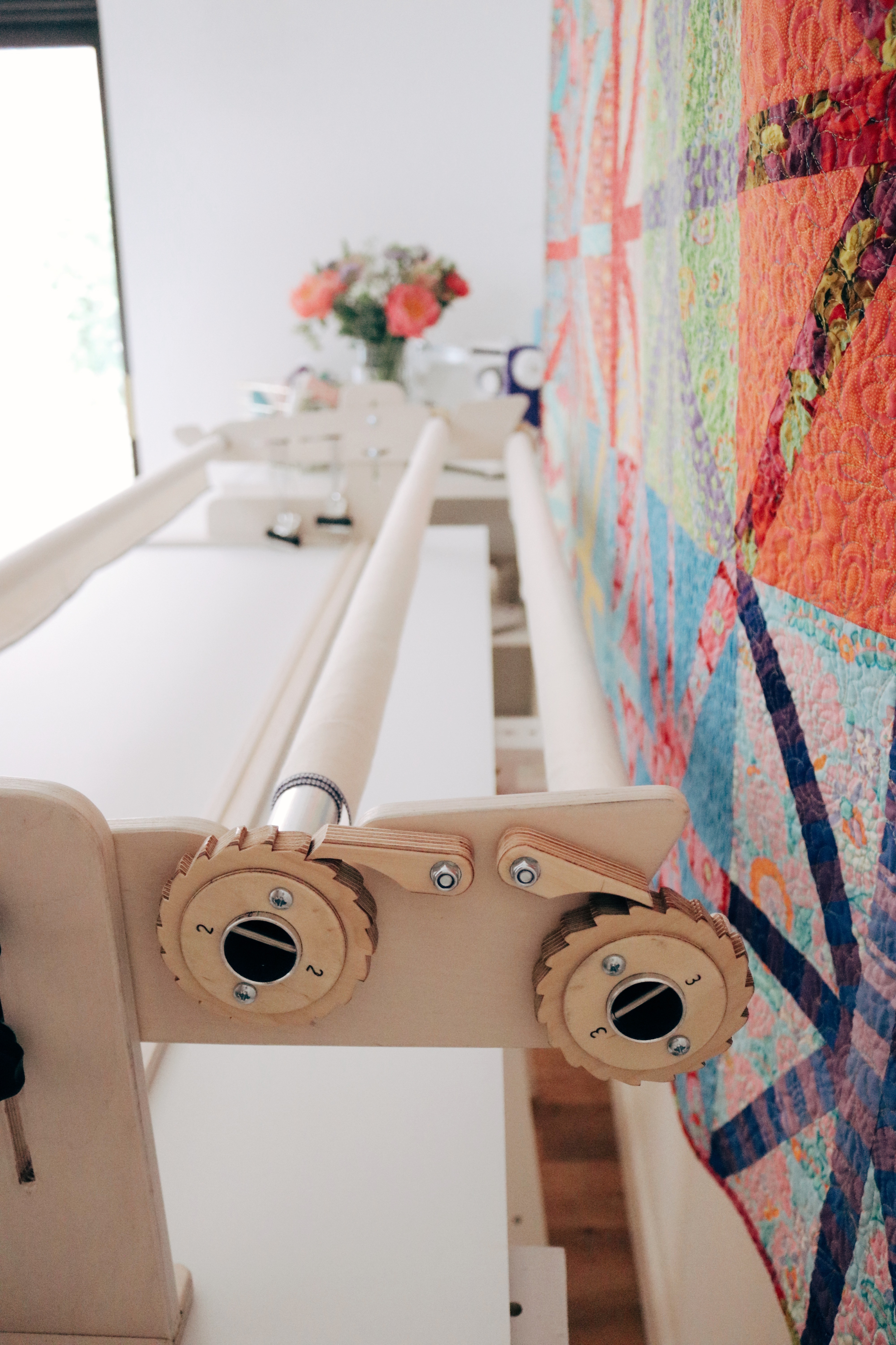 Updated frame for increased adaptability Beautiful end pieces and pole design updated to allow you to move seamlessly between quilting frame sizes.