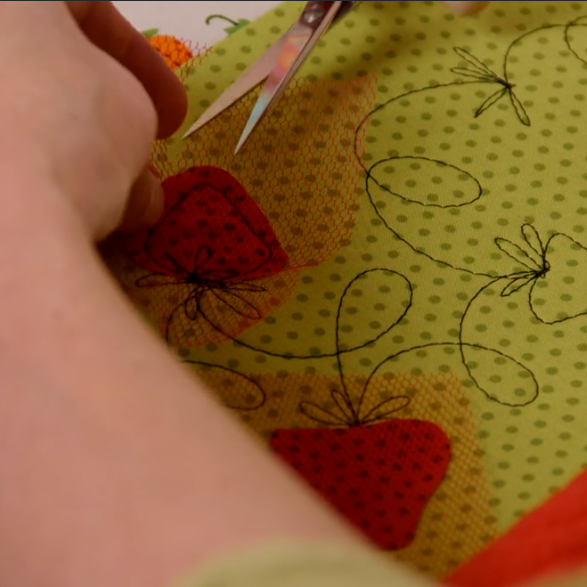 gently tug the netting up and cut around the stitched line